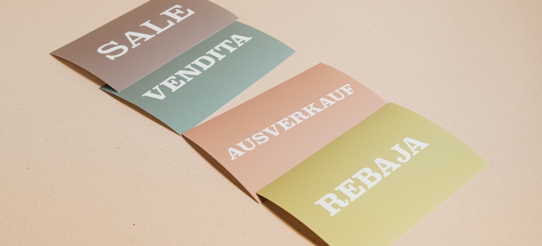 Sale sign in different languages