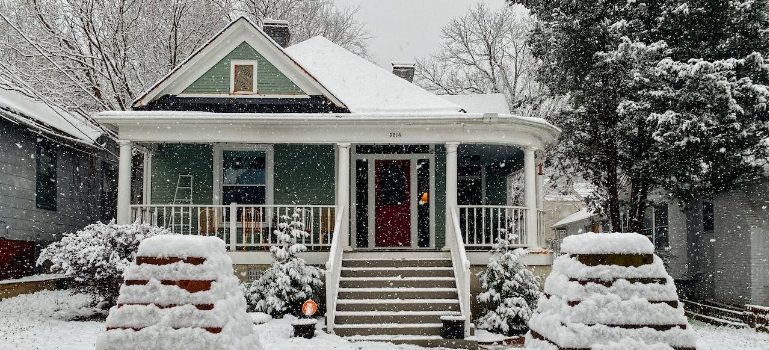 House covered in snow that people can see when they move to Springfield