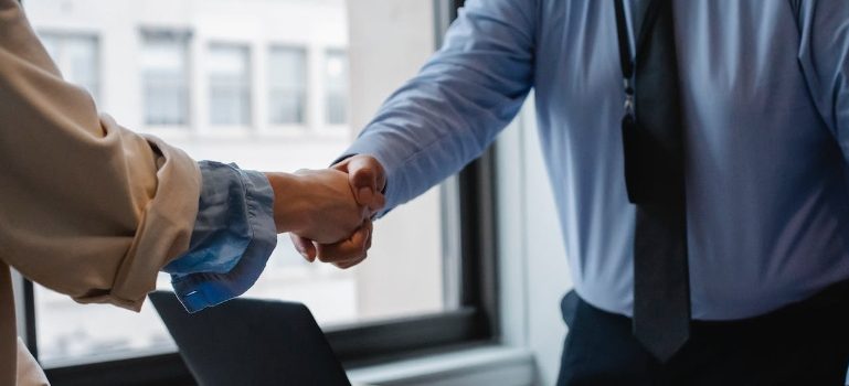 A handshake as a symbol of what a good choice it was to move to Springfield 