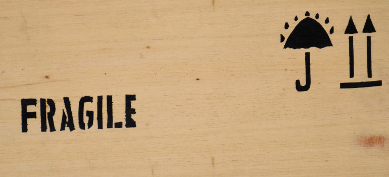 Fragile label on a container, proper labeling is one of the main steps of shipping internationally