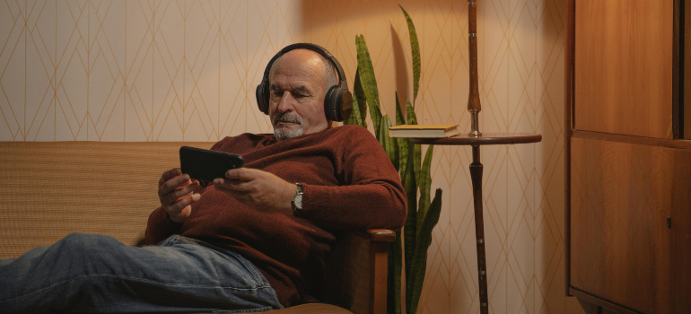 elderly man using a phone