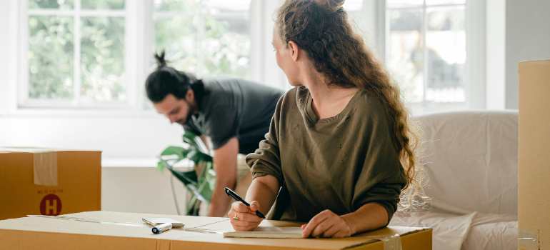 couple preparing for a move with tips for a secure and organized move