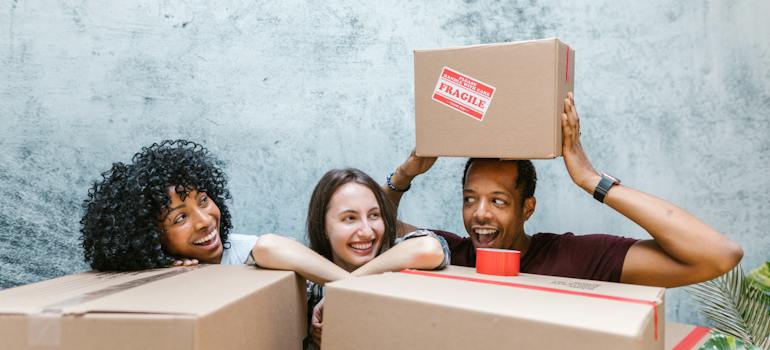 a happy group of friends ready to move