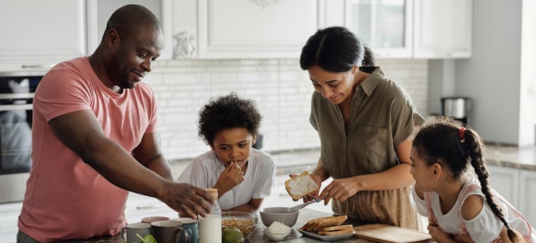 a family having a breakfast after following Post-Move Tips from Interstate Moving & Storage
