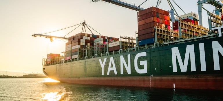 Container Ship in Harbor at Sunset