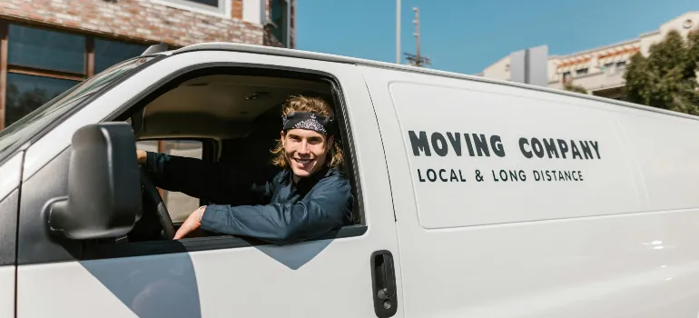 one of the movers in Chevy Chase driving a van
